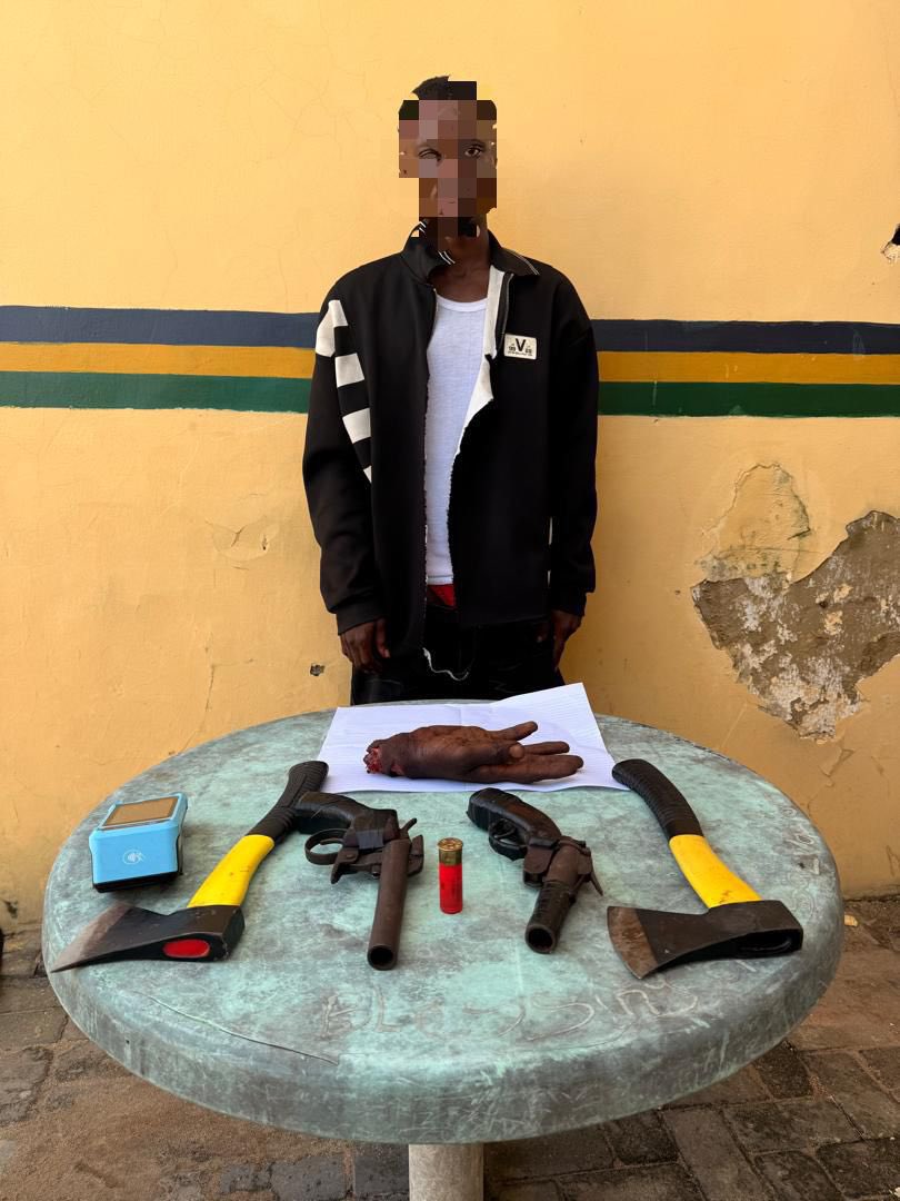 Police nab 21-year-old Samson Onilewaji with suspected human hand, pistols, one live cartridge, two axes, POS and five ATM cards in Lagos
