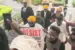 Omoyele Sowore (at the middle) being accompanied by members of his group into the Federal High Court in Abuja on