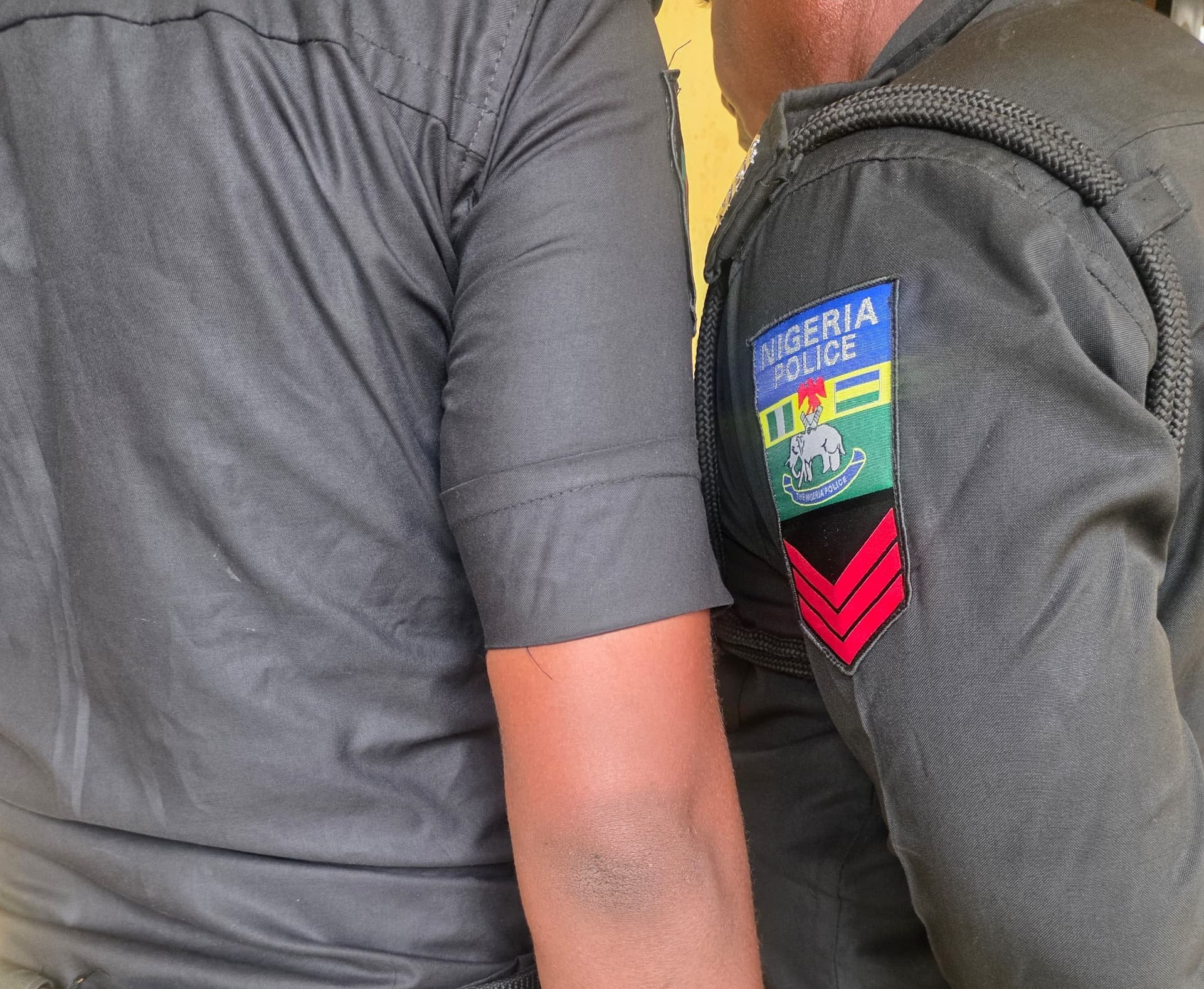 Delta Police Command demotes two officers caught on viral video receiving money from a motorist through a POS terminal in their station.