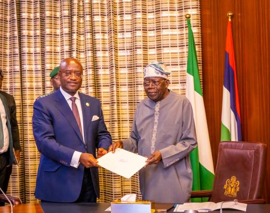 Dr. George Elombi, President and Chairman, Board of Directors of African Export-Import Bank (Afreximbank), presenting a letter of invitation to President Bola Ahmed Tinubu in the State House. July 7, 2026